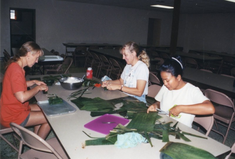 Helping prepare food for Philippine booth.jpg