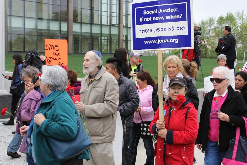 Marchers walk from courthouse to church.JPG