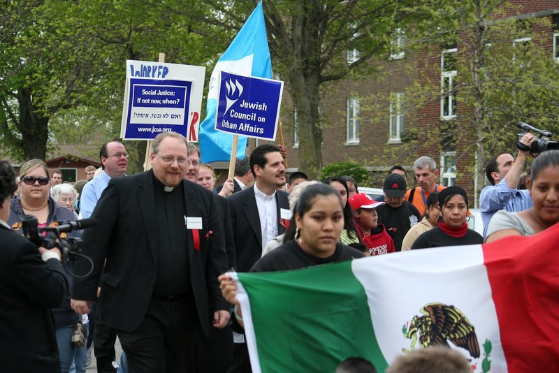 Father Paul Ouderkirk, Pastor David Vasquez, marchers.JPG