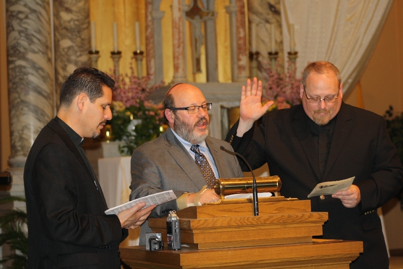 Pastor David Vasquez, Rabbi Morris Allen and Father Paul Oderkirk offer prayers during the Interfaith Prayer Service.JPG