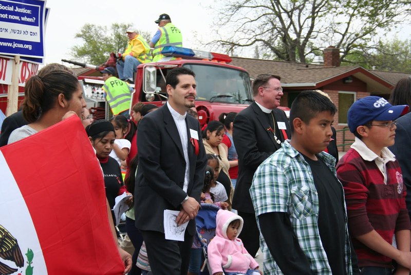 Pastor David Vasquez, Bishop Steven Ullestad, marchers.JPG