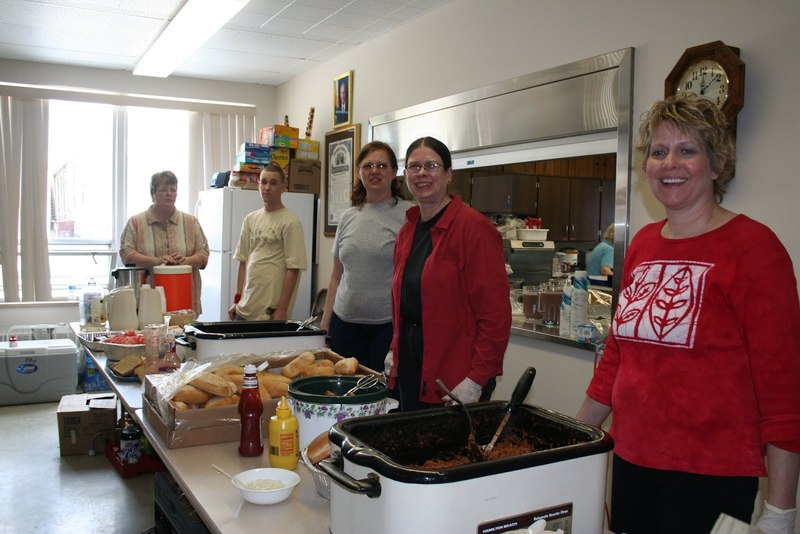 Volunteers serving food at St. Bridget's Catholic Church .JPG