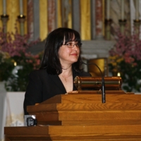 Sonia Parras-Konrad speaks at the Interfaith Prayer Service, Immaculate Conception Catholic Church.JPG