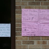 Handwritten signs outside St. Bridget&#039;s Catholic Church 01
